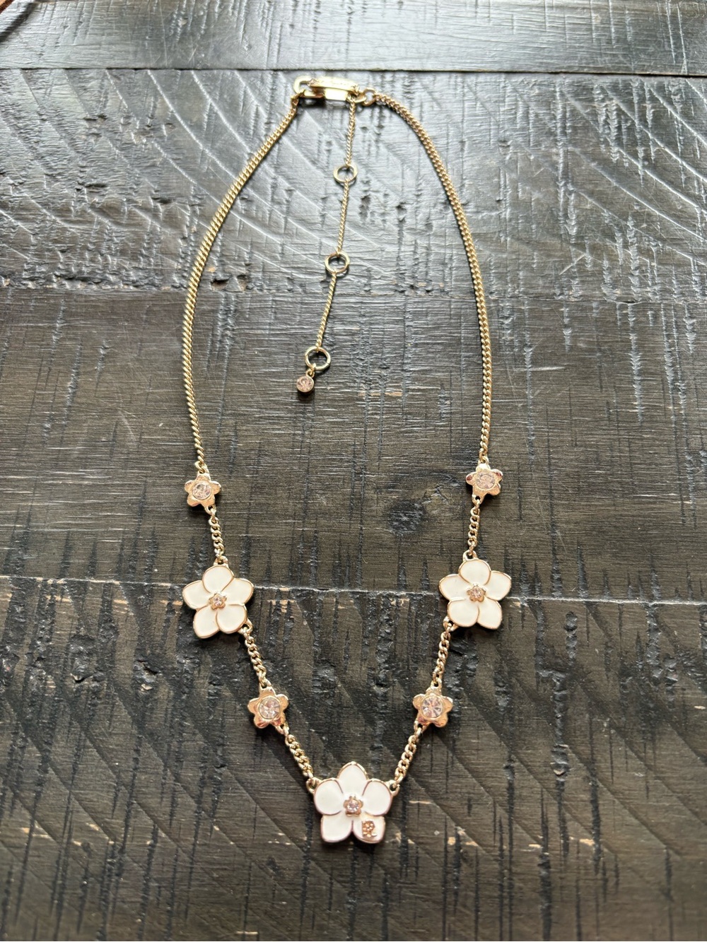 Karl Lagerfeld Paris Gold-Tone Pavรฉ White Flower Logo Statement Necklace 16โ+3โ
